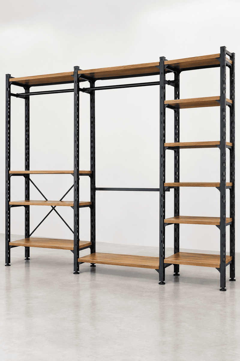A modular industrial closet organizer rack with black metal framing and light brown wood color steel shelves, shown in a clean studio setting.