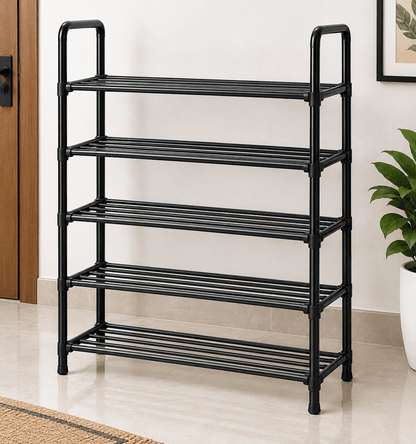 Black 5-tier home shoe rack with slatted shelves and curved top handles in a home entryway